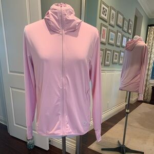 Light pink zip up lightweight hoodie with zip pockets. UPF 50.